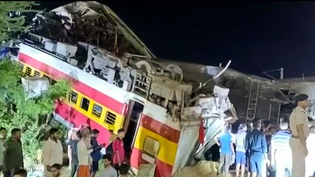 AFPTV video footage shows the flipped over train carriages. Picture: AFP