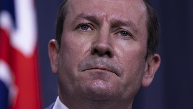 PERTH, AUSTRALIA - JUNE 29: West Australian Premier Mark McGowan speaks to media at Dumas House on June 29, 2021 in Perth, Australia. Lockdown restrictions have come into effect across the Perth and Peel regions for the next four days, following the confirmation of new community COVID-19 cases linked to the highly contagious Delta variant of the coronavirus. From midnight, residents in the Perth and Peel regions are only permitted to leave their homes for essential reasons, including purchasing essential goods, receiving medical care, or caring for the vulnerable. People may leave home to get vaccinated or to exercise within a 5-kilometre radius of their home. Weddings are restricted to five people, funerals to 10 people while gyms, beauty and hair salons, casinos and nightclubs must close. (Photo by Matt Jelonek/Getty Images)