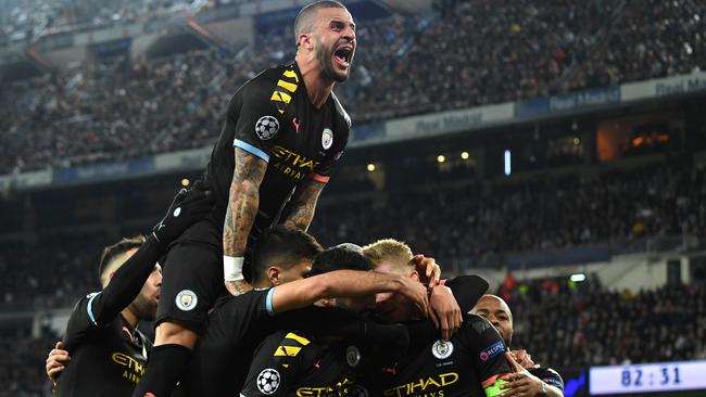 Kyle Walker joins the celebrations after Kevin De Bruyne put Manchester City ahead at the Bernabeu.