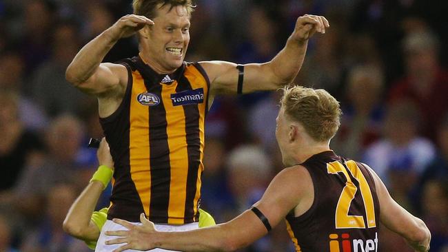 Sam Mitchell (left) and James Sicily were Hawthorn teammates not long ago. Picture: Getty Images