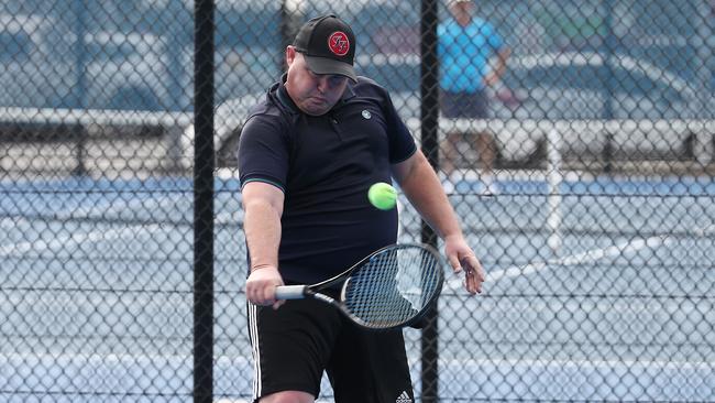 Mulgrave MP Curtis Pitt competes in the tennis competition at the 2021 Great Barrier Reef Masters Games. Picture: Brendan Radke