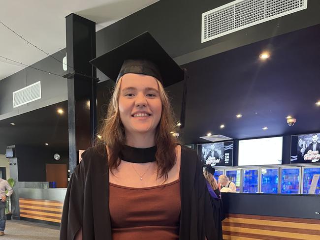 Graduates from the University of the Sunshine Coast's Fraser Coast campus celebrating at the Brolga Theatre.