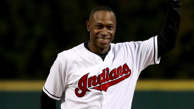 CLEVELAND, OH - OCTOBER 25: Former Cleveland Indians outfielder Kenny Lofton reacts prior to throwing out the first pitch prior to Game One of the 2016 World Series against the Chicago Cubs at Progressive Field on October 25, 2016 in Cleveland, Ohio. (Photo by Elsa/Getty Images)