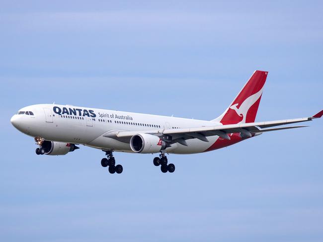 A Qantas plane lands at Tullamarine Airport, Melbourne. Picture: Mark Stewart