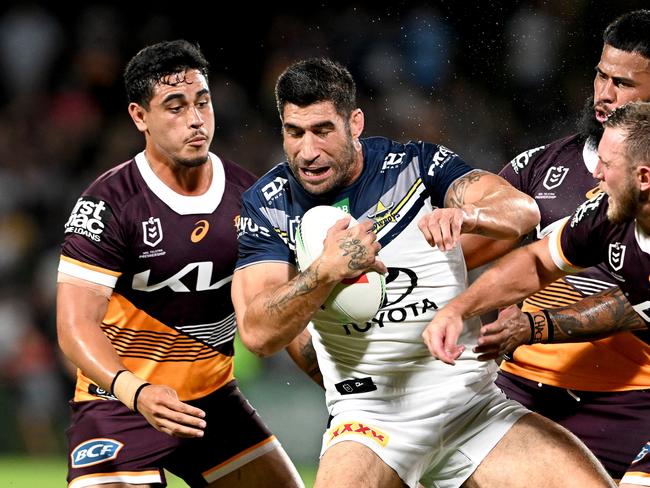 SUNSHINE COAST, AUSTRALIA - FEBRUARY 18: James Tamou of the Cowboys is tackled during the NRL Trial Match between the Brisbane Broncos and the North Queensland Cowboys at Sunshine Coast Stadium on February 18, 2023 in Sunshine Coast, Australia. (Photo by Bradley Kanaris/Getty Images)