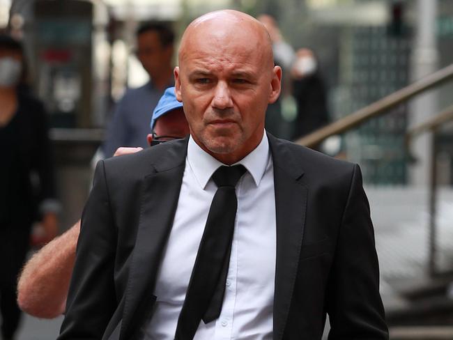 NSW detective Gary Jubelin leaving the Downing Centre Courts, today, after being found guilty of illegally recording during the William Tyrrell investigation.Picture:Justin Lloyd