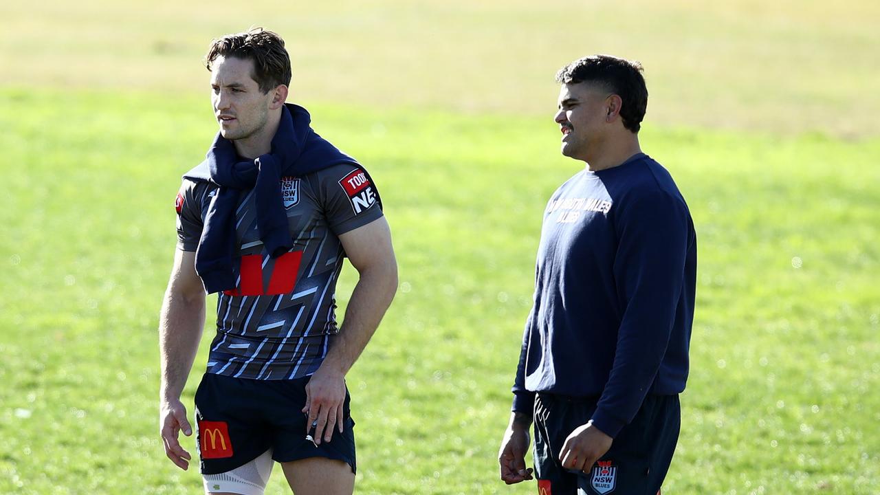 SYDNEY, AUSTRALIA - JUNE 14: (L-R) Liam Martin, Cameron Murray and Latrell Mitchell of the Blues look on during a New South Wales Blues State of Origin training session at Coogee Oval on June 14, 2023 in Sydney, Australia. (Photo by Jason McCawley/Getty Images)