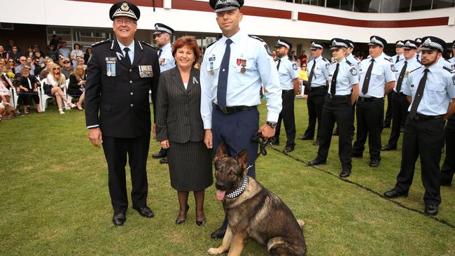 Sergeant Ian Grigoris with Rambo the day he graduated.