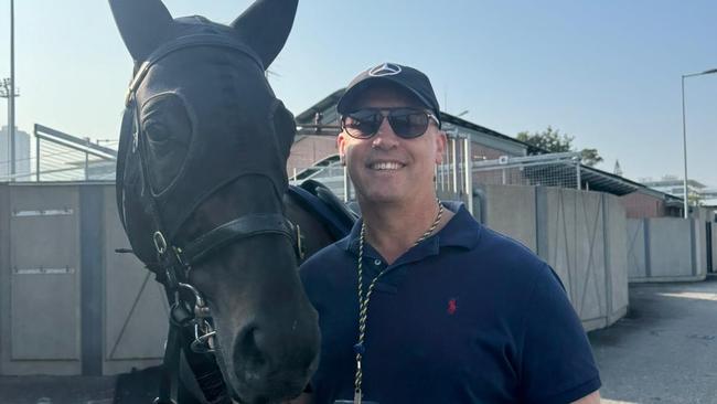 Brisbane trainer Tony Gollan with his Group 1 Hong Kong Mile Hope Antino at the Sha Tin quarantine stables. Picture: Supplied.