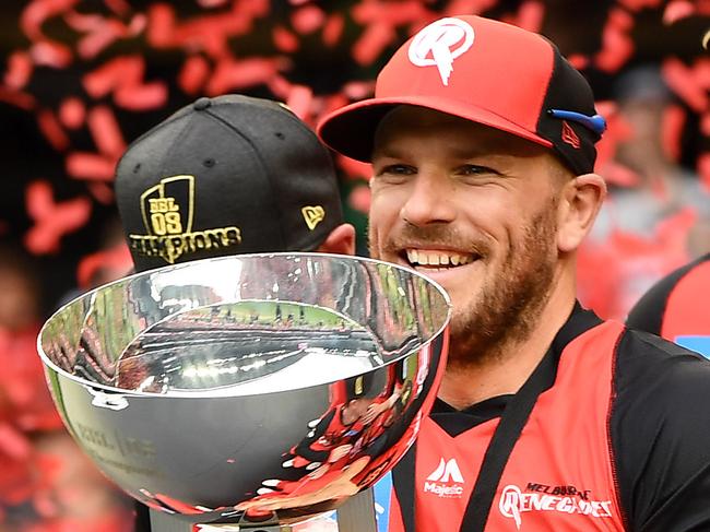 MELBOURNE, AUSTRALIA - FEBRUARY 17: The Renegades pose with the trophy after winning the Big Bash League Final match between the Melbourne Renegades and the Melbourne Stars at Marvel Stadium on February 17, 2019 in Melbourne, Australia. (Photo by Quinn Rooney/Getty Images)