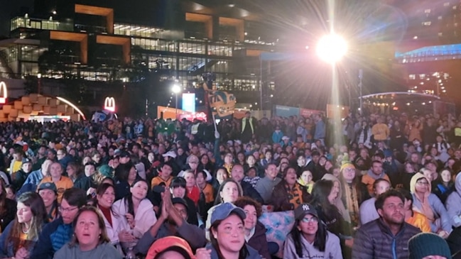 Fans applaud the Matildas at the Sydney live site