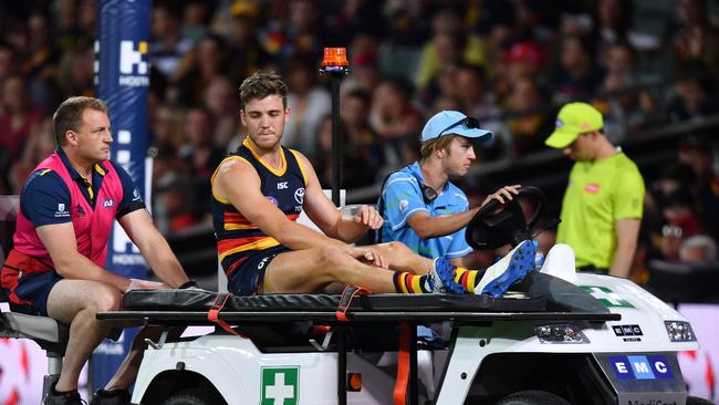 Paul Seedsman is taken from the ground after a head knock in 2019. Picture: AAP Image/David Mariuz