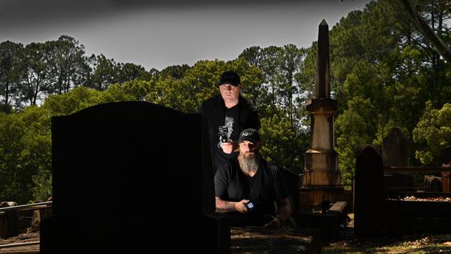 GHOST BUSTERS: Daniel Rickard and Pete Cazzolato check a cemetery for paranormal activity. Picture: John McCutcheon