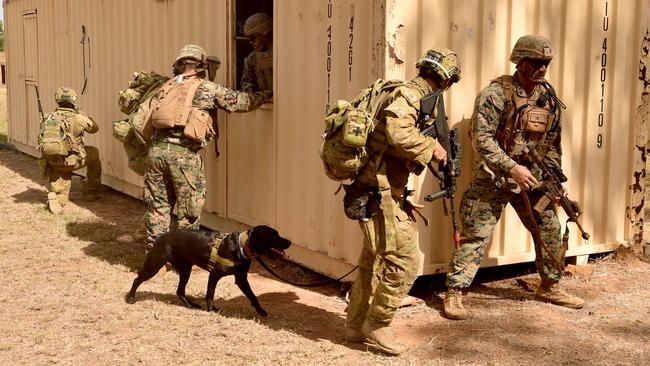 US Marines in conjunction with Australian soldiers from Battle Group Eagle comprising of elements of 3rd Brigade conduct an urban clearance of a fictitious invading force at the Townsville Filed Training Area. US Marines in connection with M1 A1 Abrams tanks from 2nd Calvary Regiment began an urban clearance at the Urban Operations Training Facility. Picture: Evan Morgan