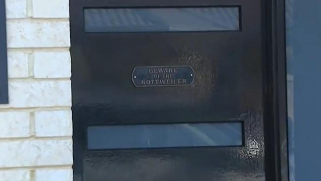 Ms Piil had a plaque which read: ‘Beware the rottweiler’ on her front door. Picture: 9News