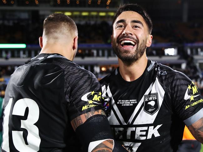 AUCKLAND, NEW ZEALAND - OCTOBER 13: Shaun Johnson of the Kiwis celebrates with James Fisher-Harris after winning the international Rugby League Test Match between the New Zealand Kiwis and the Australia Kangaroos at Mt Smart Stadium on October 13, 2018 in Auckland, New Zealand.  (Photo by Hannah Peters/Getty Images)