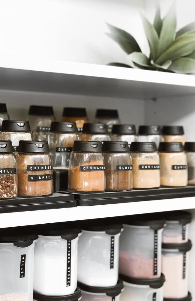 The pantry cupboard is a well-oiled machine, custom-made by Ashlee.