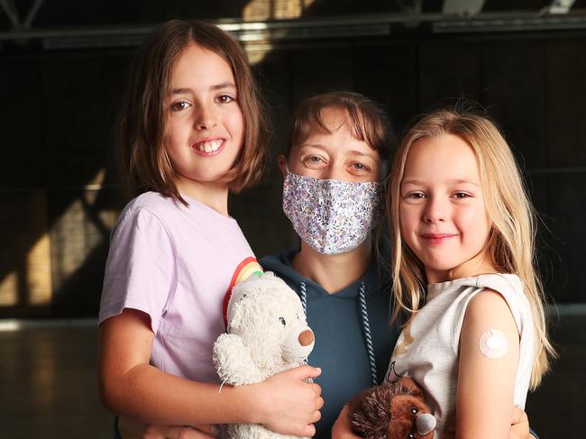 SUN TAS.  Claire Huxtable with daughters Ellie Huxtable 8 and Imogen Huxtable 6 after both sisters had their second covid vaccination.  Vaccination clinics for 5 to 11 year olds at PW1.  Picture: Nikki Davis-Jones