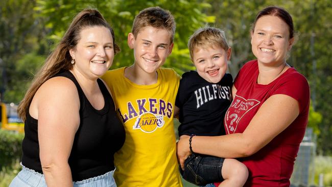 14-year-old Kruz Greensill with mum Tamiya Greensill (left), and six-year-old Kaiden Hyde with mum Kim Dixon reunite for the first time since the near-fatal drowning. Picture: Richard Walker