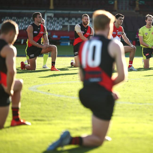 The Bombers and Swans. (Photo by Cameron Spencer/AFL Photos/Getty Images)