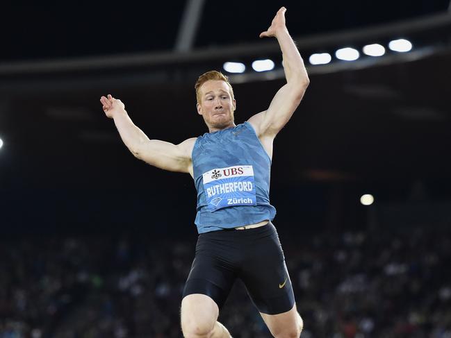 (FILES) This file photo taken on September 3, 2015 shows Britain’s Greg Rutherford competing in the men's long jumps event during the Diamond League Athletics Weltklasse meeting in Zurich. Rutherford has made the decision to freeze his sperm because of fears about the Zika virus at this year's Games in Rio de Janeiro. / AFP PHOTO / MICHAEL BUHOLZER