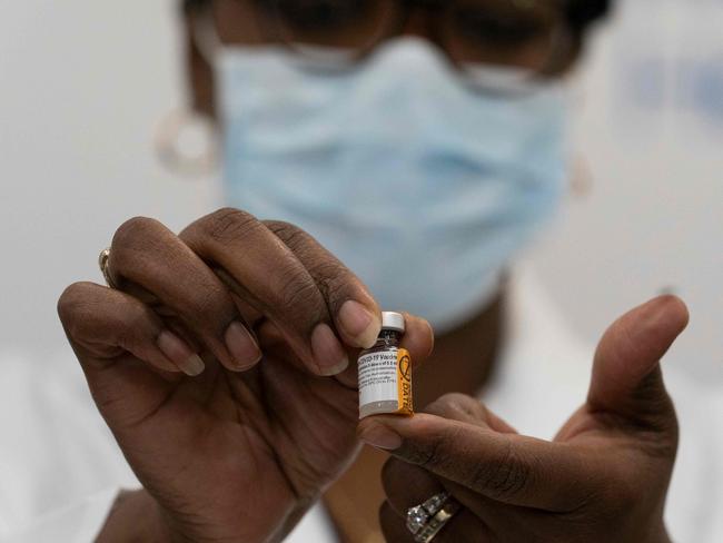 Dr. Michelle Chester holds a vial of the COVID-19 vaccine at Long Island Jewish Medical Center. Picture: AFP.