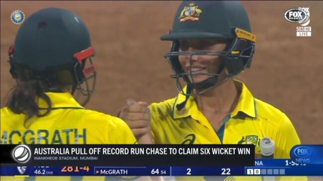 Aussies down India in record run chase