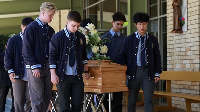 Daniel Amirbekyan (front, left) was among the pallbearers at Calvin Wijeweera’s funeral. Picture: Justin Lloyd