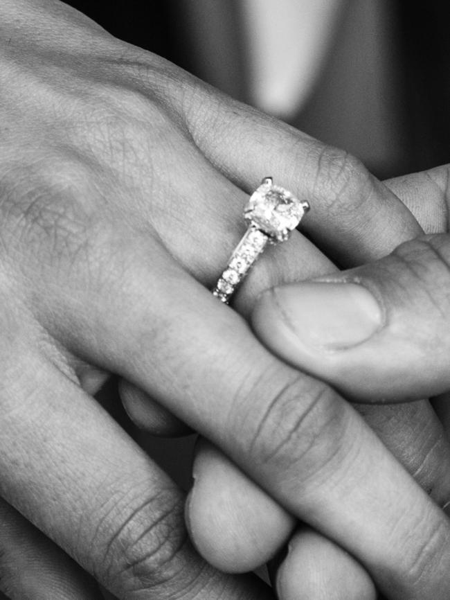 Michelle proudly shows off her engagement ring. Photo credit: Leigh Hope.