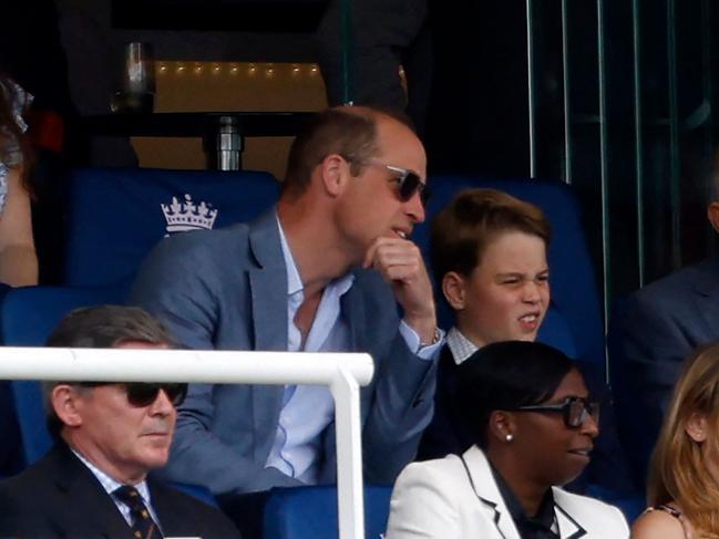 Prince William and Prince George watch the afternoon session on day four of the second Ashes cricket Test match between Australia and England at Lord's cricket ground. Picture: AFP