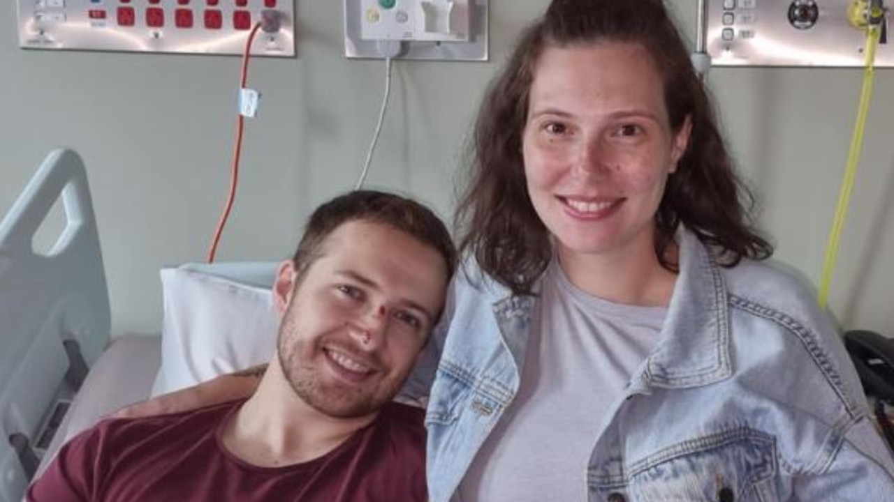 Randall Kirk and his wife Bree following his surgery to have shrapnel removed from his leg.