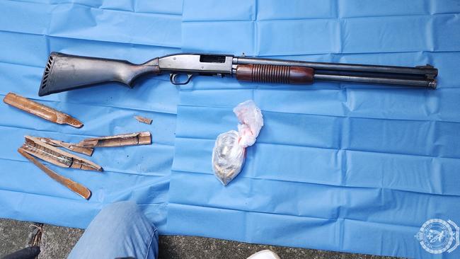 The 36-year-old man allegedly attempted to dispose of the firearms over the balcony. Picture: Police Multimedia.