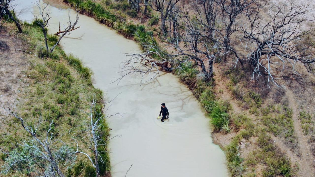 Police searching Wippo Creek after Jeremiah Rivers’ disappearance.