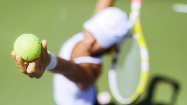 Beautiful female tennis player serving outdoor and a closeup of the serve from above