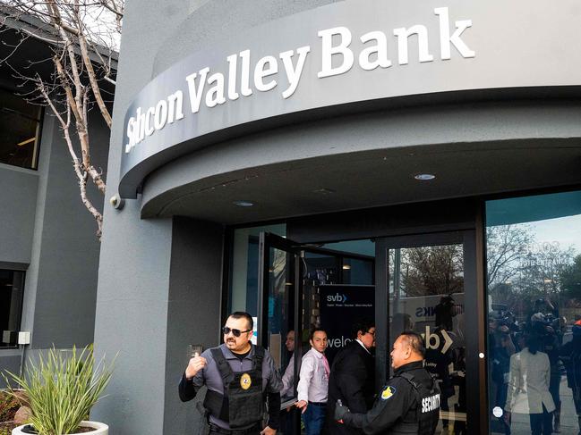 Security guards open a Silicon Valley Bank (SVB) branch for customers at SVB’s headquarters in Santa Clara, California. Picture: AFP