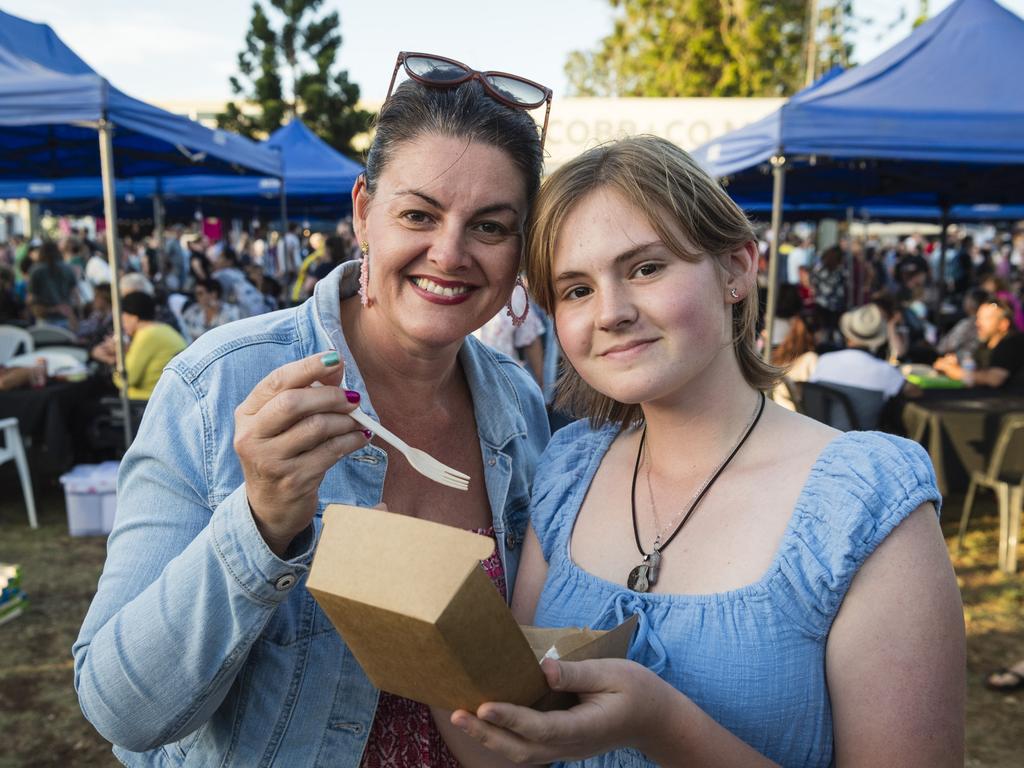 Kathleen (left) and Rikkie Moon enjoy a Swedish desert at Twilight Eats at the Windmills, Saturday, November 18, 2023. Picture: Kevin Farmer