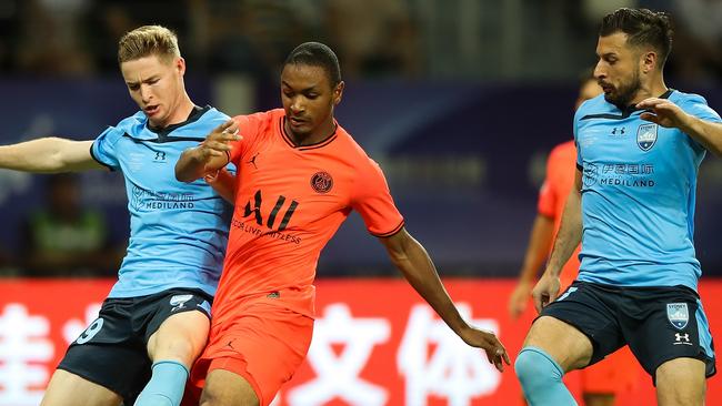 Harry Van der Saag competes for the ball with Abdou-Lakhad Diallo of Paris Saint Germain during the International Super Cup in July.