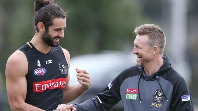 Nathan Buckley talks to Brodie Grundy at Collingwood training. Picture: Michael Klein