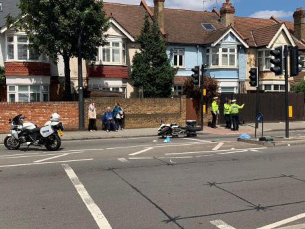 The motorbike seen on its side after the accident. Picture: Twitter/ Supplied