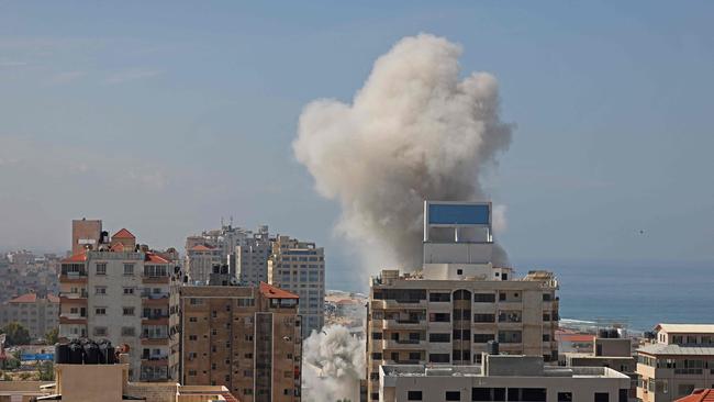 Smoke billows from a residential building following an Israeli air strike in Gaza City. Picture: AFP