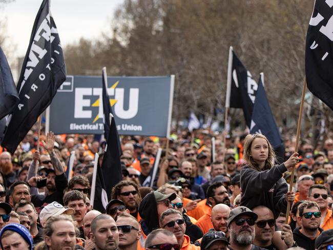 Trades workers participate in a protest in solidarity with CFMEU. Picture: Diego Fedele