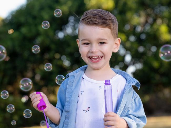 COPYRIGHT WARNING for Moreton Life ONLY. Phone Kylie Knight 3480 8226. KidsFest cover Teddy Beckett, 4, of Warner plays with bubbles in the park.