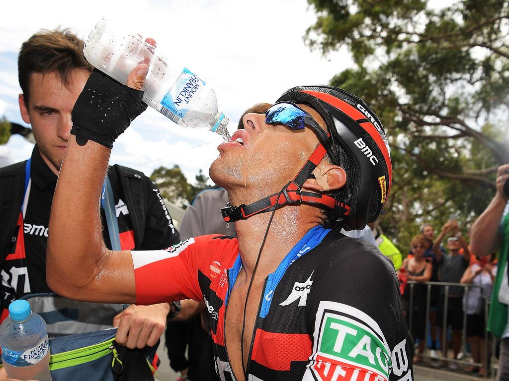 Richie Porte gulps it down after winning Stage Five. Daniel Kalisz/Getty Images