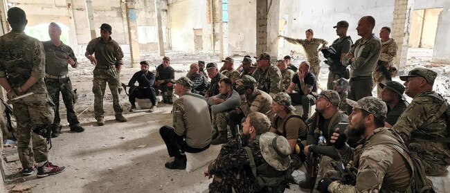 Felix Metrikas, back right, during his time training military recuits in Ukraine. Picture: supplied.