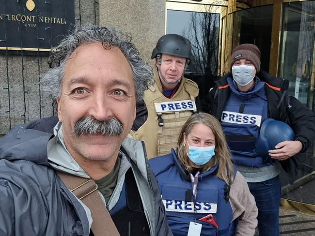 This undated image courtesy of Fox News shows cameraman Pierre Zakrzewski (left) posing with colleagues at the Kyiv Intercontinental Hotel. Picture: FOX NEWS / AFP