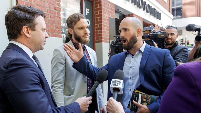 Hersant’s supporters Thomas Sewell and Joel Davis clashed with media outside court in October. Picture: David Geraghty / NewsWire