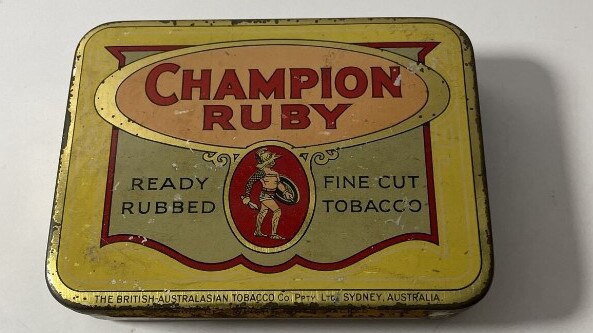 This used Champion Ruby tobacco tin, manufactured in Sydney sold for $760 on eBay in July this year after receiving 12 bids. Picture: eBay / @lostinspace-o