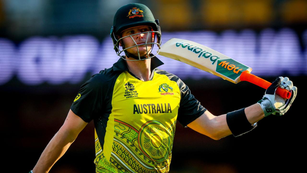 Australia's Steve Smith walks back to the pavilion after his dismissal by India's Yuzvendra Chahal during the Australia 2022 Twenty20 World Cup cricket warm-up match between Australia and India at the Gabba in Brisbane on October 17, 2022. (Photo by Patrick HAMILTON / AFP) / --IMAGE RESTRICTED TO EDITORIAL USE - STRICTLY NO COMMERCIAL USE--