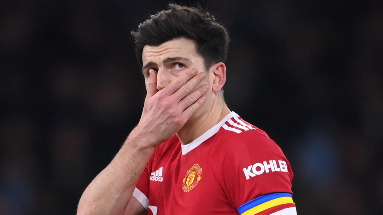 MANCHESTER, ENGLAND - MARCH 06: Harry Maguire of Manchester United looks dejected following their sides defeat after the Premier League match between Manchester City and Manchester United at Etihad Stadium on March 06, 2022 in Manchester, England. (Photo by Laurence Griffiths/Getty Images)