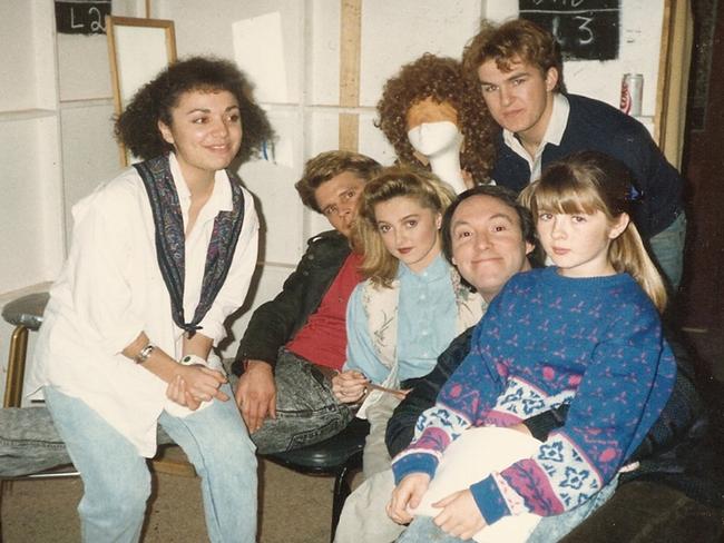 Cast of the TV show Hey Dad! including Robert Hughes, Sarah Monahan (sitting on his lap) and Simone Buchanan (to Hughes’ left).